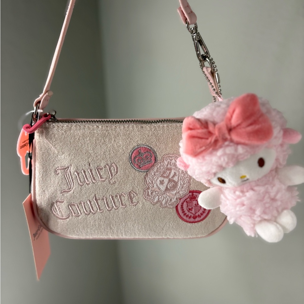 Juicy Couture Pale Pink Suede-Look Logo Wristlet with Plush Bow Charm
